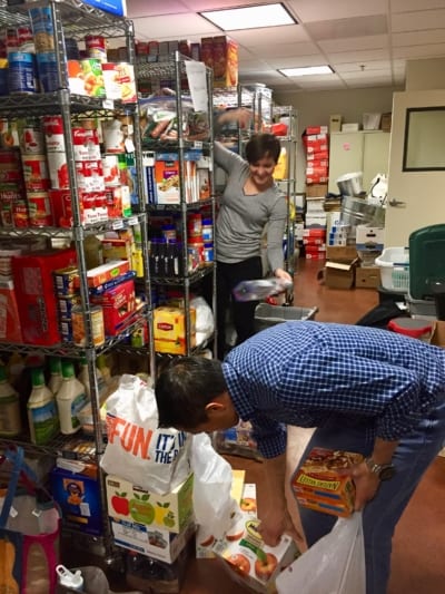 cleaning and organzing food donations - Red Team Consulting